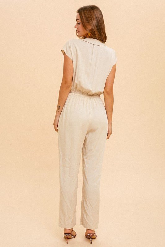 Shona Collared JumpsuitPRODUCT DESCRIPTION: Live easy in the Shona Collared Jumpsuit. Made of a lightweight woven fabric, this jumpsuit is the perfect thing to take you from brunch to errands and everything in between. Features a straight leg fit, elastic