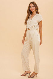 Shona Collared JumpsuitPRODUCT DESCRIPTION: Live easy in the Shona Collared Jumpsuit. Made of a lightweight woven fabric, this jumpsuit is the perfect thing to take you from brunch to errands and everything in between. Features a straight leg fit, elastic