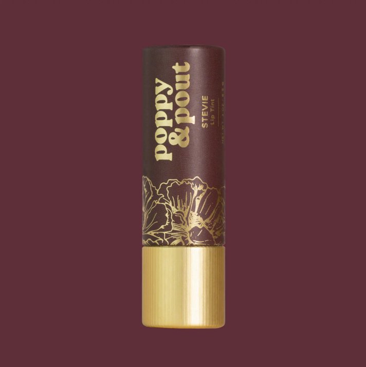 Stevie Lip TintYour favourite Poppy & Pout lip balm formula, now with a subtle tint! The Stevie Lip Tint is a moody, dark mauve shade. Apply once for sheer coverage or double up for a more colourful lip. All lip tints come in one flavour, Sweet Mint. All