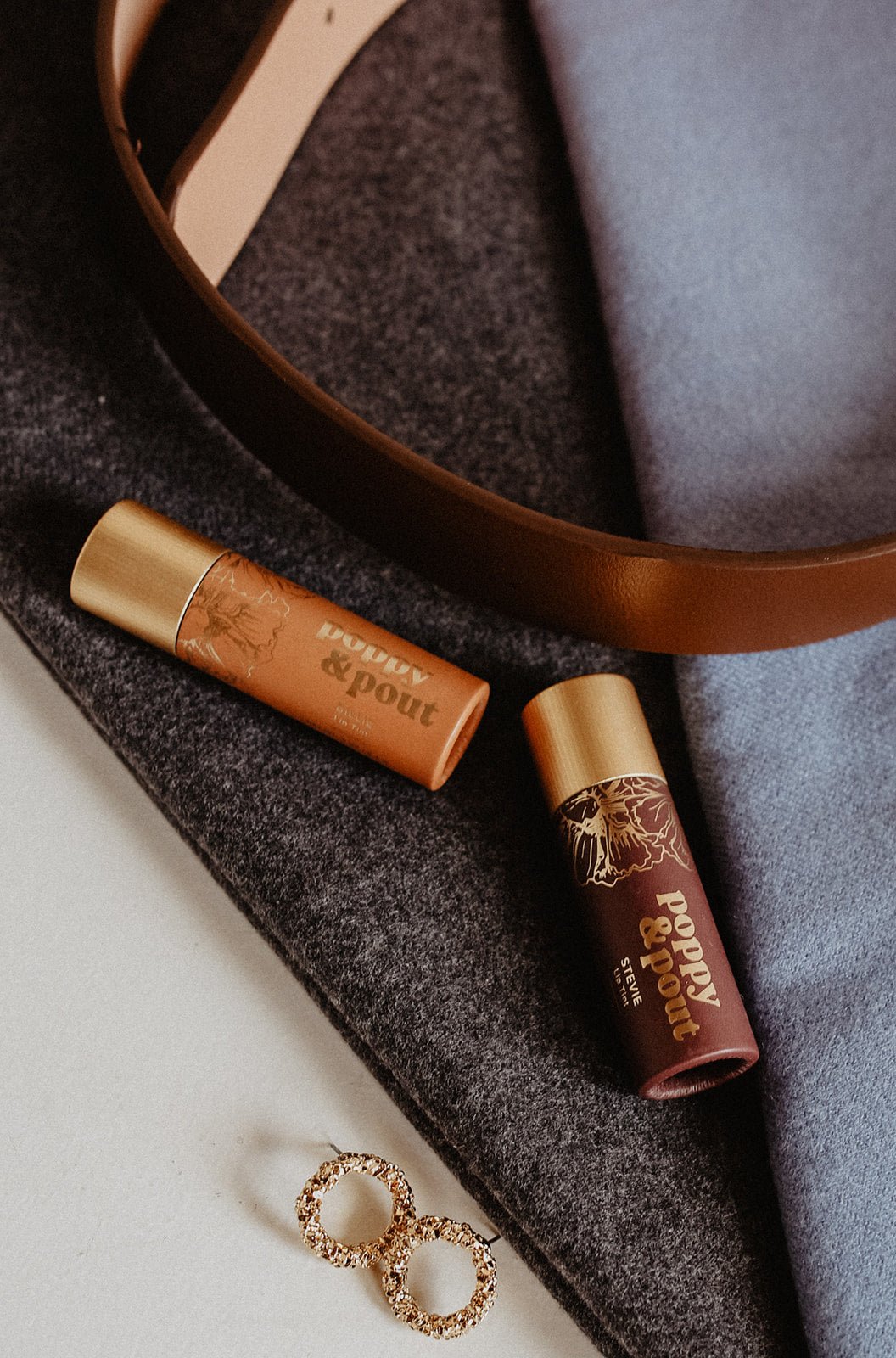 Stevie Lip TintYour favourite Poppy & Pout lip balm formula, now with a subtle tint! The Stevie Lip Tint is a moody, dark mauve shade. Apply once for sheer coverage or double up for a more colourful lip. All lip tints come in one flavour, Sweet Mint. All